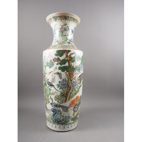 80 - *A Chinese famille verte flared rim baluster vase with animals and birds in a landscape decoration, ... 