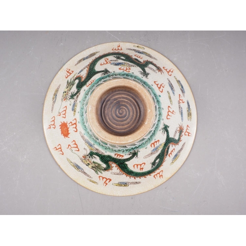 84 - A Chinese crackle glazed bowl, decorated nine figures, 11