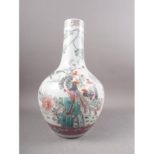 86 - A Chinese porcelain polychrome enamel decorated vase with bird design, 16