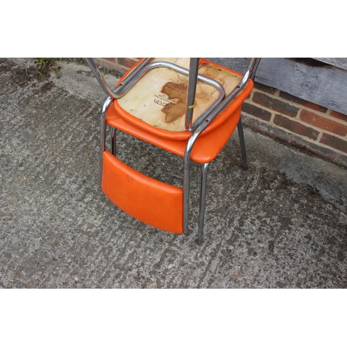 503 - A set of four Keron chrome frame kitchen chairs, upholstered in an orange leatherette