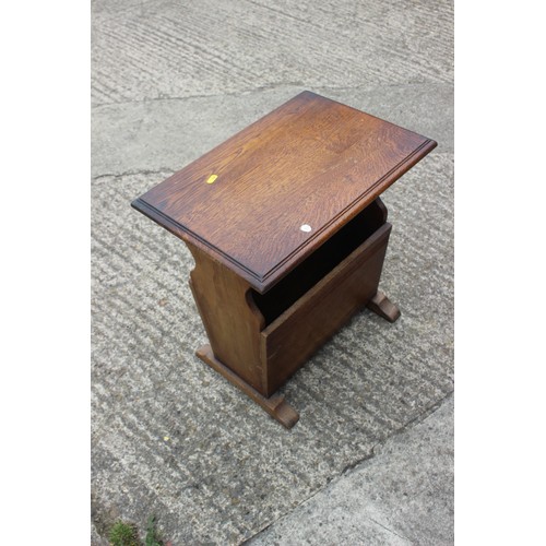 538 - An Edwardian walnut side chair with stuffed over seat, on fluted supports, and an oak magazine stand