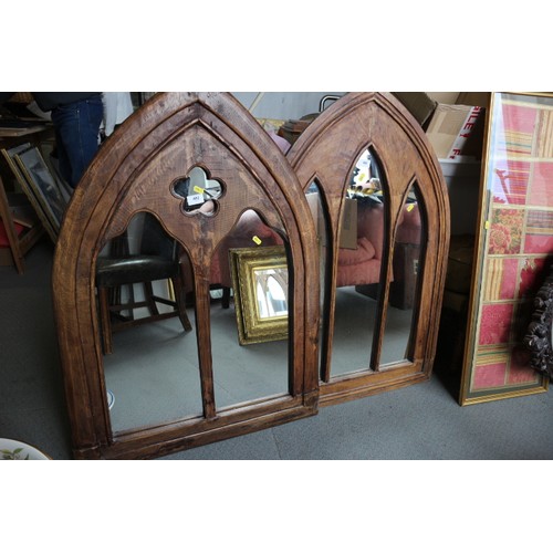 482 - A hardwood arch topped Gothic style triple-plate wall mirror, 39