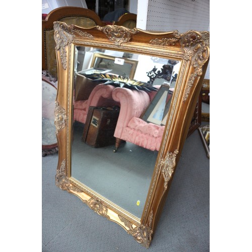 483 - A rectangular shaped wall mirror with bevelled plate, 19 1/2