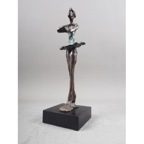 127 - After Giacometti: a patinated figure of a dancer, 9