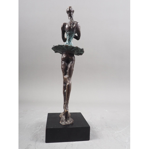 127 - After Giacometti: a patinated figure of a dancer, 9