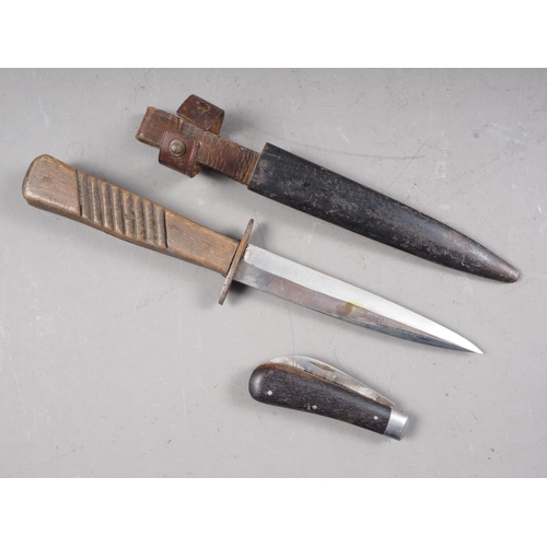 144 - A WWI German trench knife with scabbard blade, 5 1/2