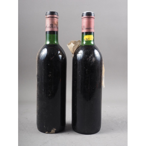 179 - Two bottles of Chateau Eglise Clinet Pomerol 1970, high shoulder