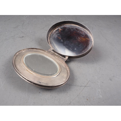 287 - An 18th century white metal, tortoiseshell and mother-of-pearl inlaid oval patch box