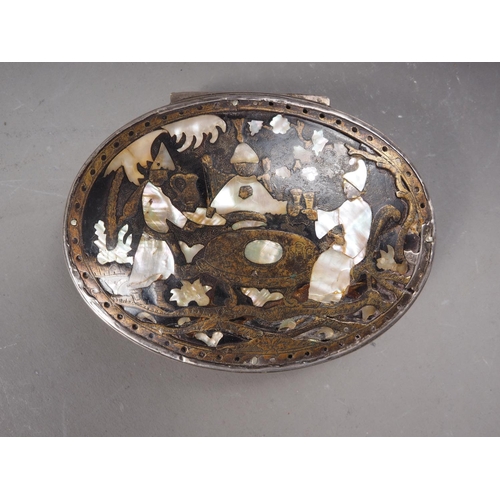 287 - An 18th century white metal, tortoiseshell and mother-of-pearl inlaid oval patch box