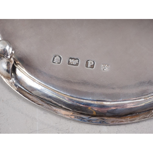 303 - A silver circular shaped card tray with engraved ostrich motif and gadrooned border, on ball and cla... 