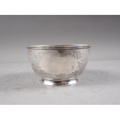 305 - A silver bowl with engraved butterfly and flower decoration, 4 1/4