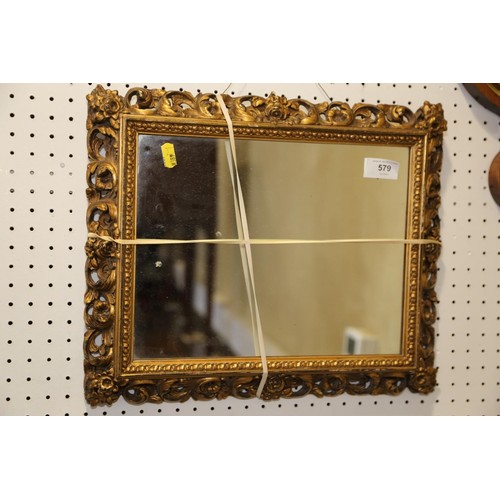 473 - A 19th century rectangular gilt Florentine frame with mirror plate, 13