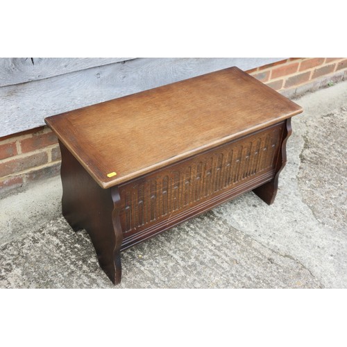 501 - A 1930s oak arcade carved front linen chest, 39