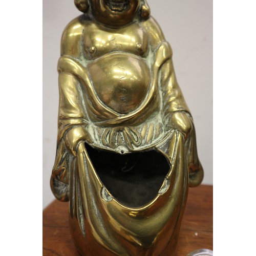 92 - A Chinese brass censor, formed as a Hotei and a child, 9