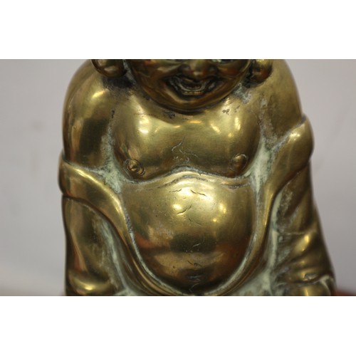 92 - A Chinese brass censor, formed as a Hotei and a child, 9