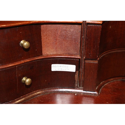 464 - A Georgian mahogany bureau bookcase, the upper section dentil moulding, enclosed glazed panel doors ... 