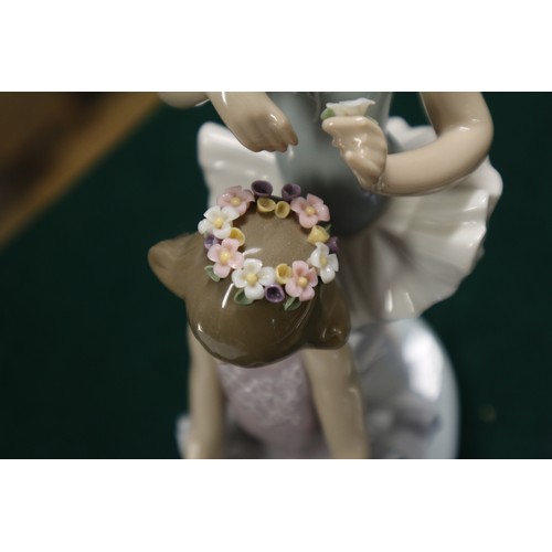 9 - Two Lladro figures, 