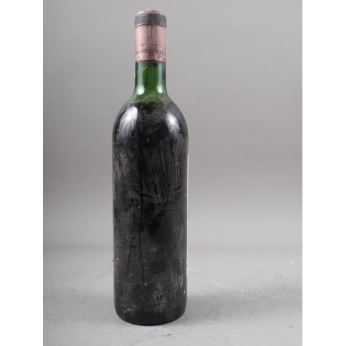 223 - A bottle of Chateau Eglise Clinet Pomerol 1964, medium shoulder