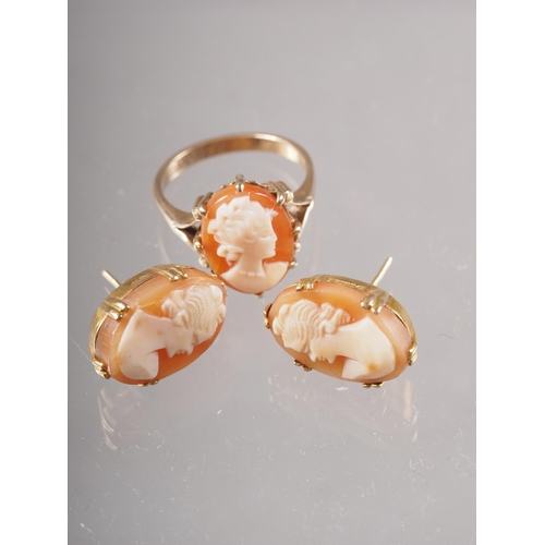 401 - A 9ct gold and carved shell cameo dress ring, size L, 3.1g, and a similar pair of ear studs, 3.6g