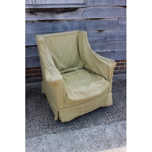 572 - A late 19th century square arm chair with down loose seat cushion, on turned and castored supports