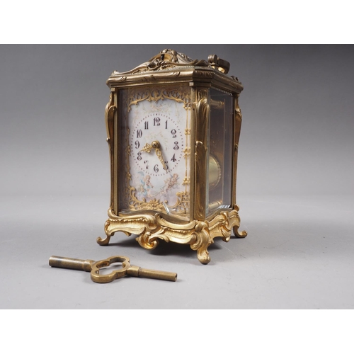 110 - A late 19th century French bronze and bevelled glass repeating carriage clock with enamelled dial, p... 