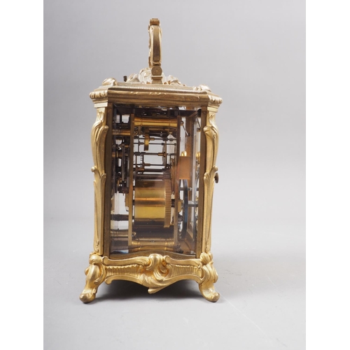 110 - A late 19th century French bronze and bevelled glass repeating carriage clock with enamelled dial, p... 