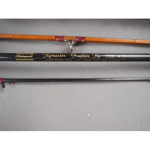 A Shakespeare Flymaster graphite 275cm fly fishing rod, a Shakespeare  Aerial carbon fibre 300cm fly