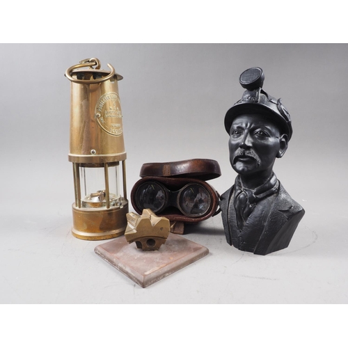 241 - A brass and glass miner's lamp, by Eccles, a composite bust of a miner, a cased pair of binoculars a... 