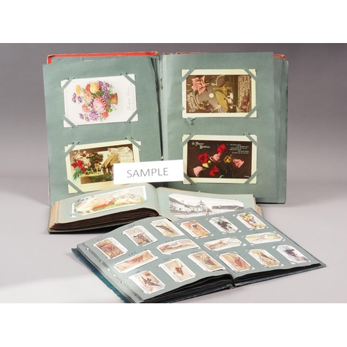 288 - A quantity of 19th century and later ephemera, including postcard albums, cigarette card albums, sta... 