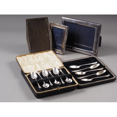 320 - A set of six silver teaspoons, in box, a similar set of five teaspoons, 3.4oz troy approx, and three... 