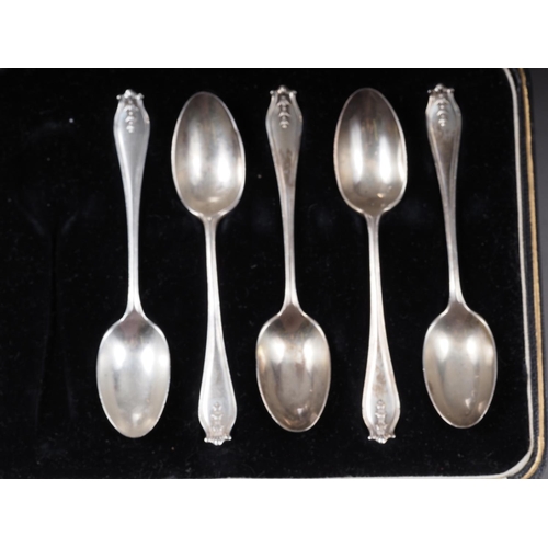 320 - A set of six silver teaspoons, in box, a similar set of five teaspoons, 3.4oz troy approx, and three... 