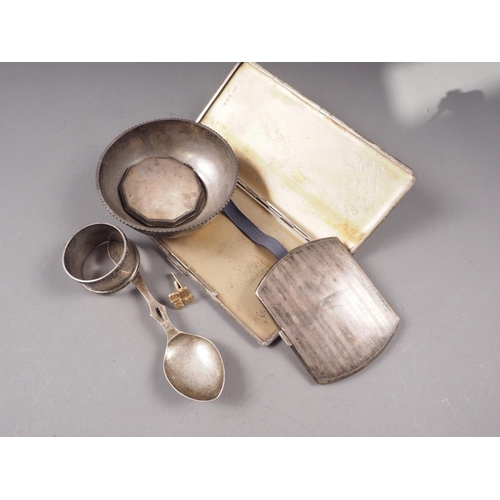 331 - Two silver cigarette cases, a silver compact, a silver bowl, a silver napkin ring and a silver prese... 