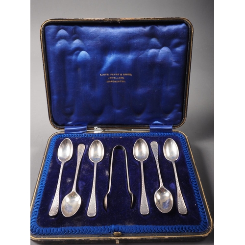 339 - A cased set of six silver teaspoons and matching sugar tongs with bright cut decoration, 3.2oz troy ... 