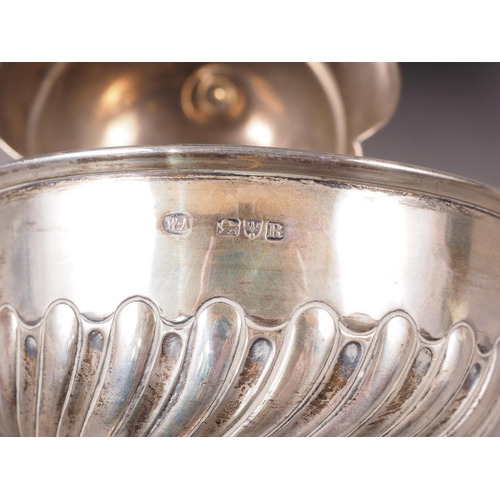 342 - A silver pedestal bowl with half-fluted decoration, a silver sugar bowl (damages), total weight 6.2o... 