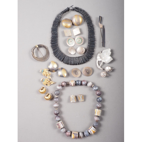 393 - A selection of 20th century Modernist silver jewellery, comprising two necklaces, seven pairs of ear... 