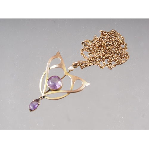 395 - An Art Nouveau style yellow metal pendant necklace, set amethysts, 4.6 gram