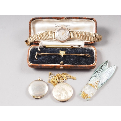 397 - A yellow metal sporting themed bar brooch, in original box, another similar, a lady's wristwatch, a ... 