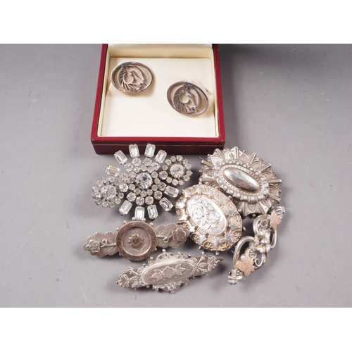 400 - A pair of silver cufflinks, decorated horses heads, five Victorian and later silver brooches and a p... 