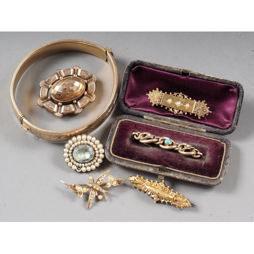 402 - A Victorian 15ct gold brooch, another similar yellow metal brooch set, seed pearls formed as a bird ... 