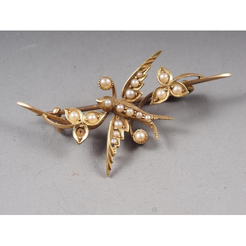 402 - A Victorian 15ct gold brooch, another similar yellow metal brooch set, seed pearls formed as a bird ... 