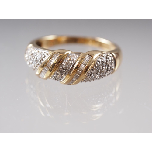 412 - An 18ct gold and diamond dress ring, size O, 4.4g