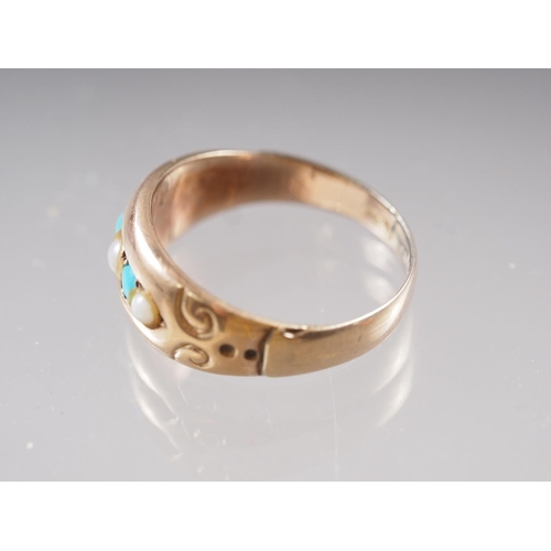 414 - A 9ct gold, turquoise and seed pearl dress ring, size J, 2g