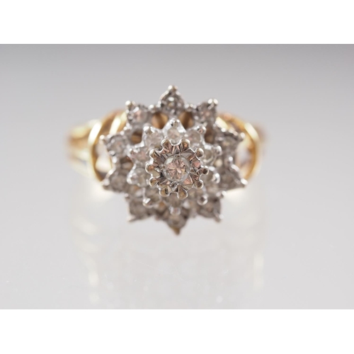 415 - An 18ct gold and diamond cluster ring, size M, 4.9g