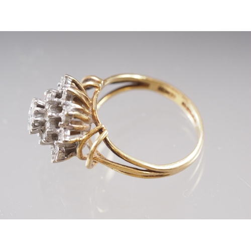 415 - An 18ct gold and diamond cluster ring, size M, 4.9g