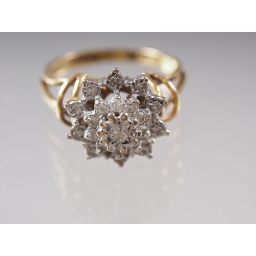 415 - An 18ct gold and diamond cluster ring, size M, 4.9g