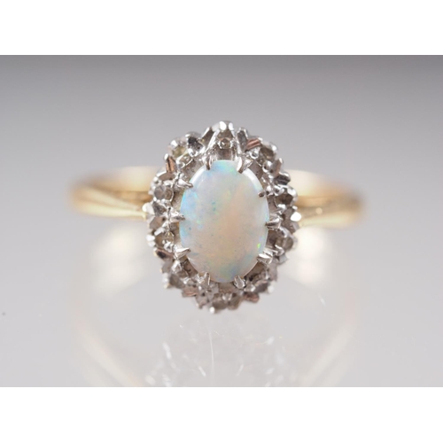 416 - An 18ct gold, platinum, opal and diamond cluster ring, size I, 2.9g