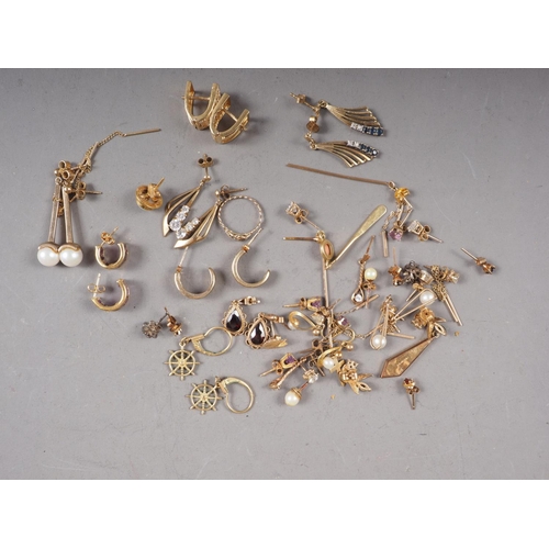 419 - A collection of 9ct gold and yellow metal earrings, ear studs, etc., total weight 39.9g