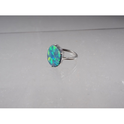 433 - A white gold, platinum and opal doublet dress ring, size L/M, 2.2g