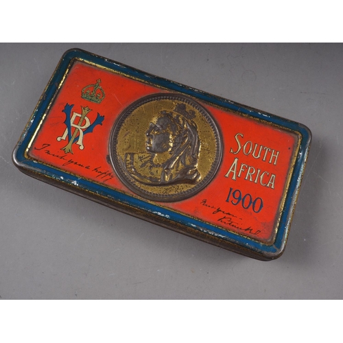 453 - A Queen Victorian South Africa tin, containing a number of military and other related medals, brooch... 