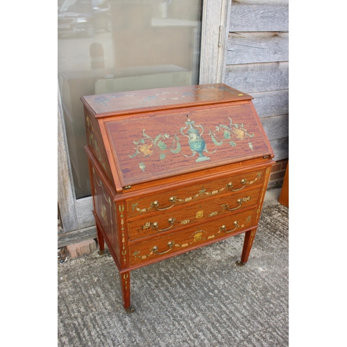 549 - A Sheraton Revival painted and banded satinwood fall front bureau with fitted interior over three dr... 